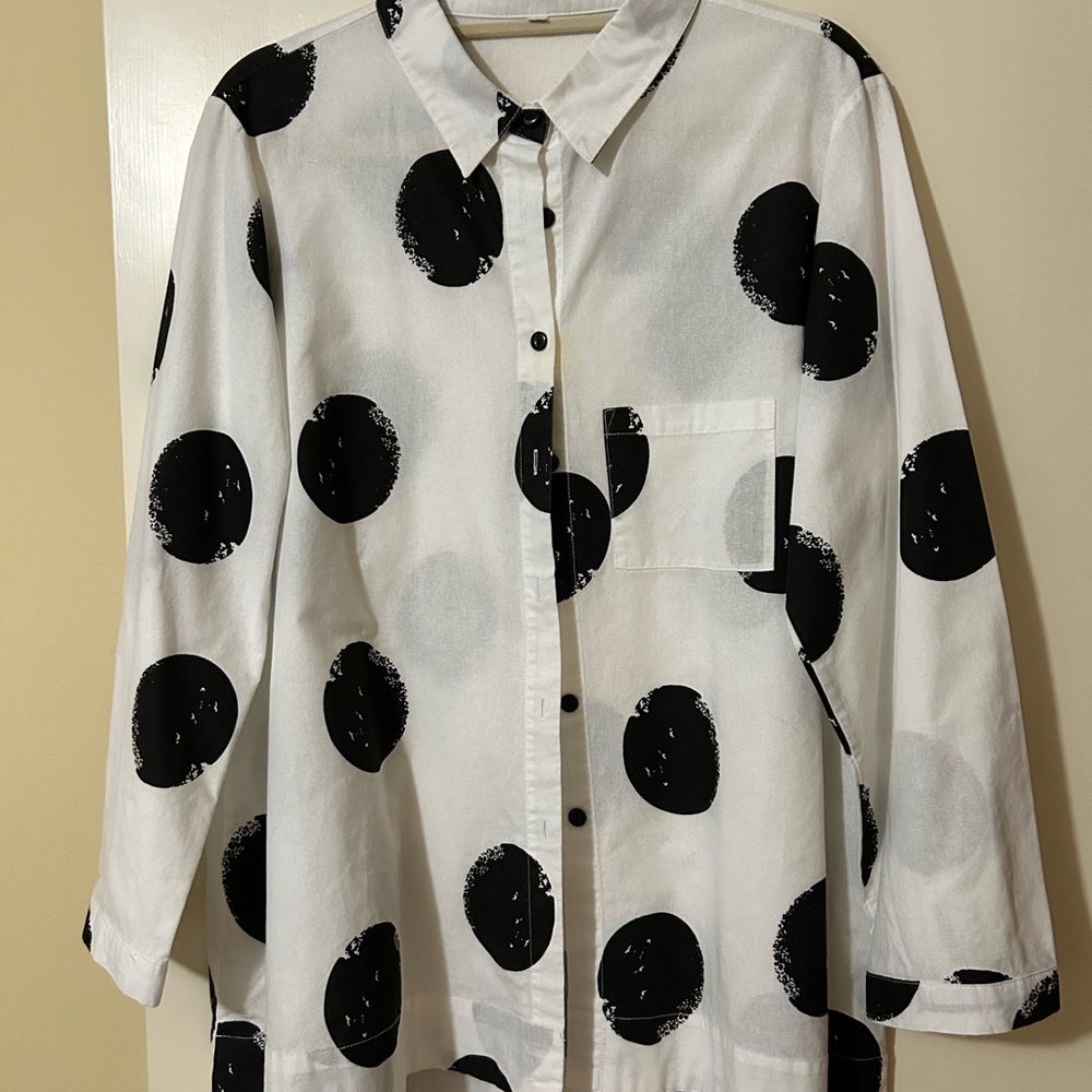 White high low shirt with black polka dots. Cotton size L